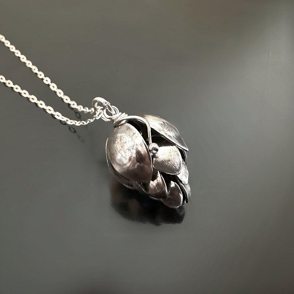 Hand made sterling silver hops flower pendant.