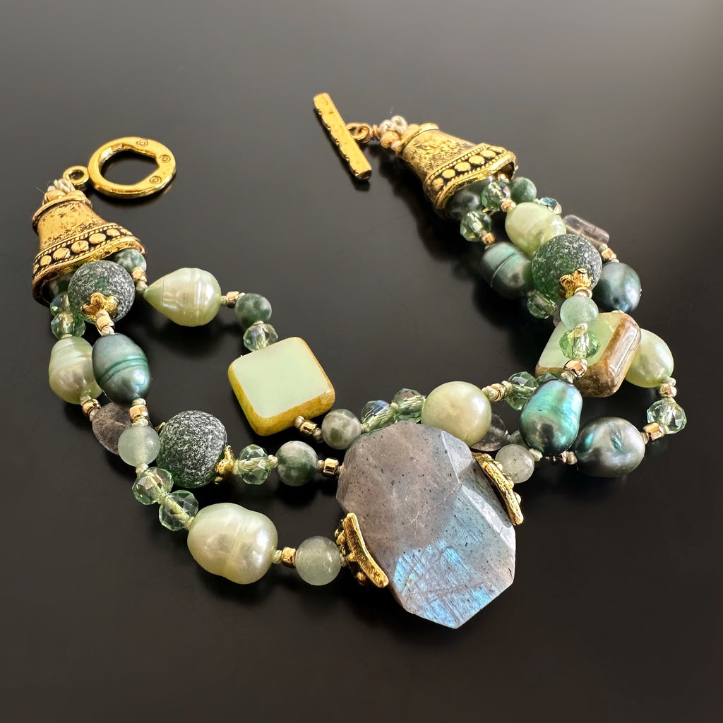 three-strand hand-knotted bracelet with labradorite, green freshwater pearls, glass and golden accents.