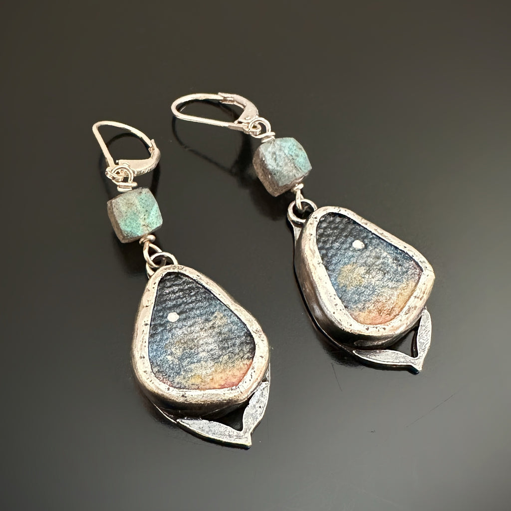 Hand painted canvas focal drops set in sterling silver and topped with labradorite. The paintings depict an early morning sky and morning star.