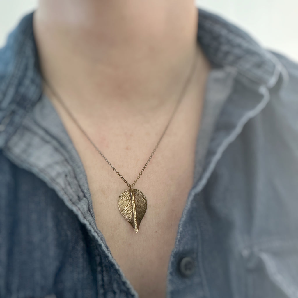large necklace, hand formed and hammer textured leaves made of oxidized brass, choose from four sizes.