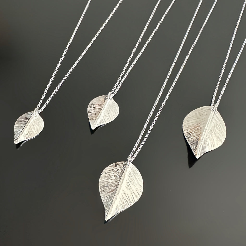 choose from four different size options of the handmade sterling silver leaf