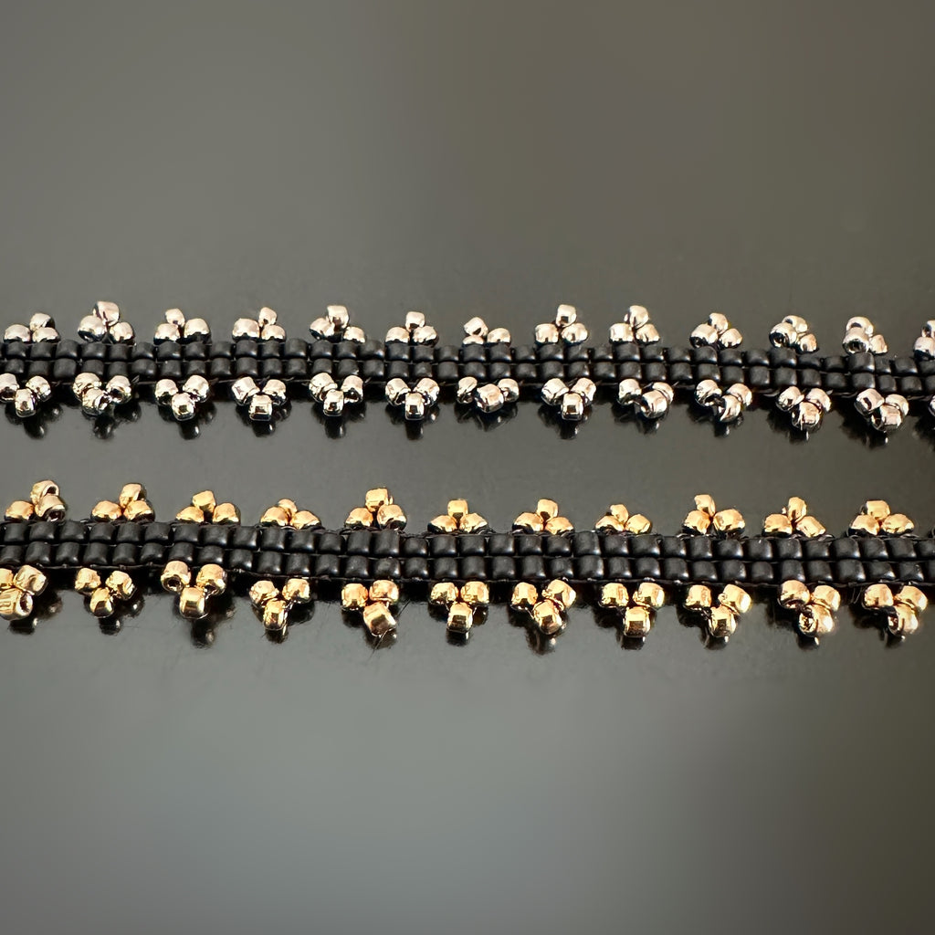 matte black hand stitched beaded bracelets with either gold or accents
