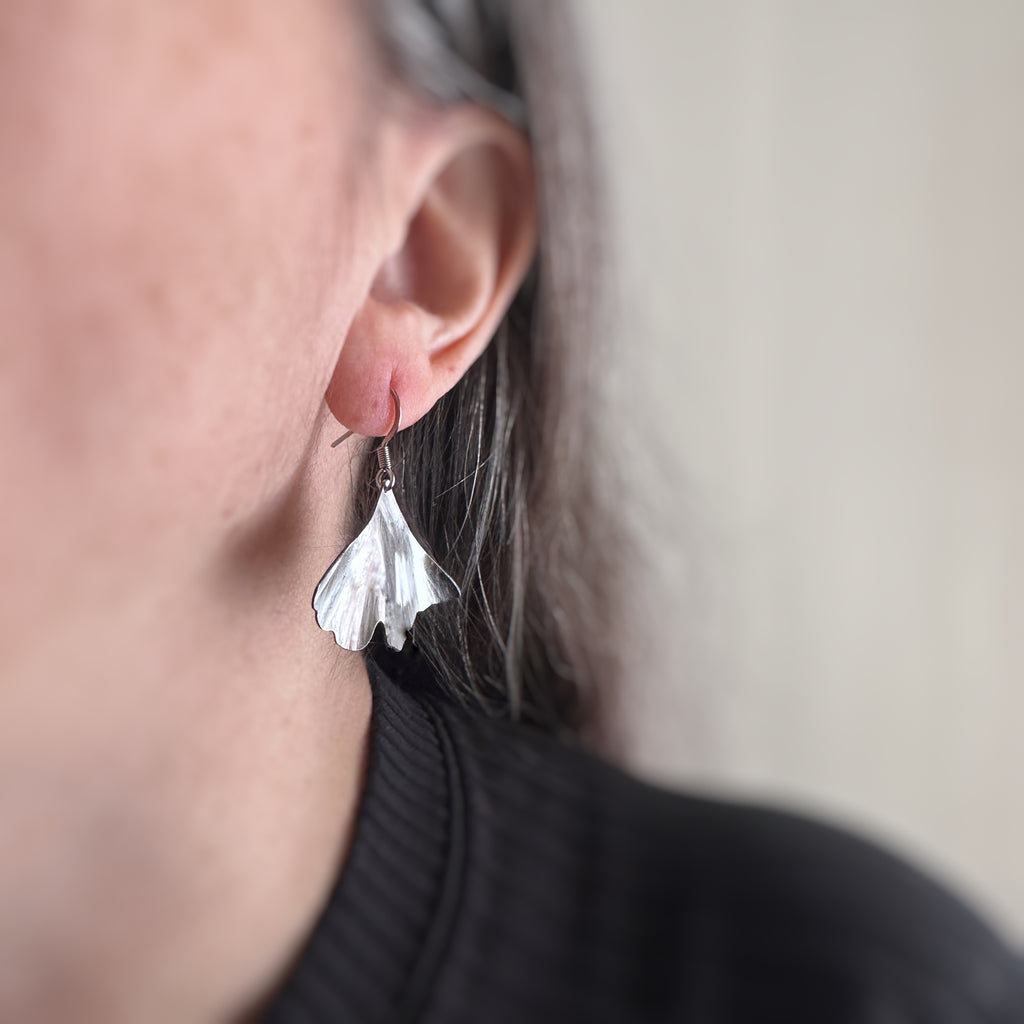 surgical grade hypoallergenic and tarnish resistant 304 stainless steel ginkgo leaf dangle earring in the large size.