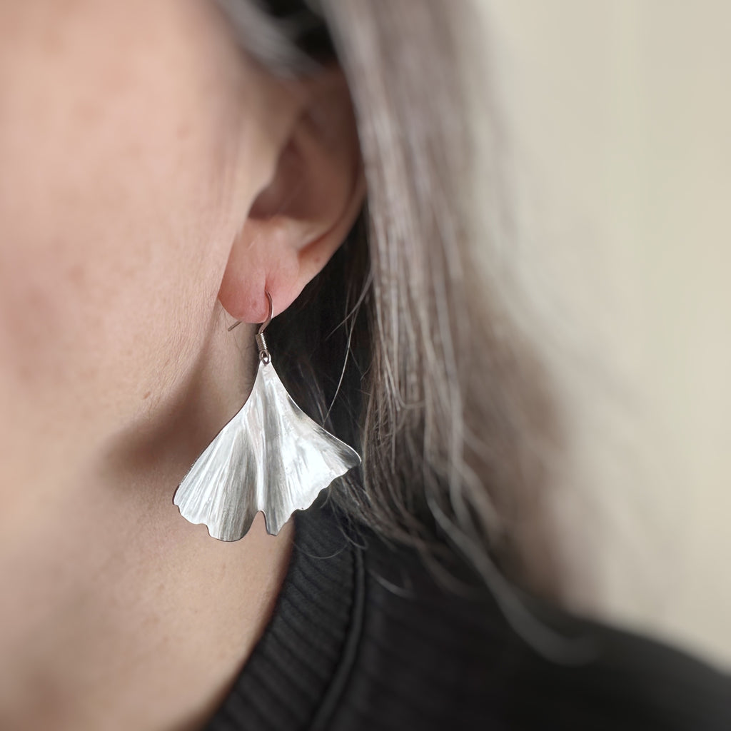 surgical grade hypoallergenic and tarnish resistant 304 stainless steel ginkgo leaf dangle earring in the extra large size.