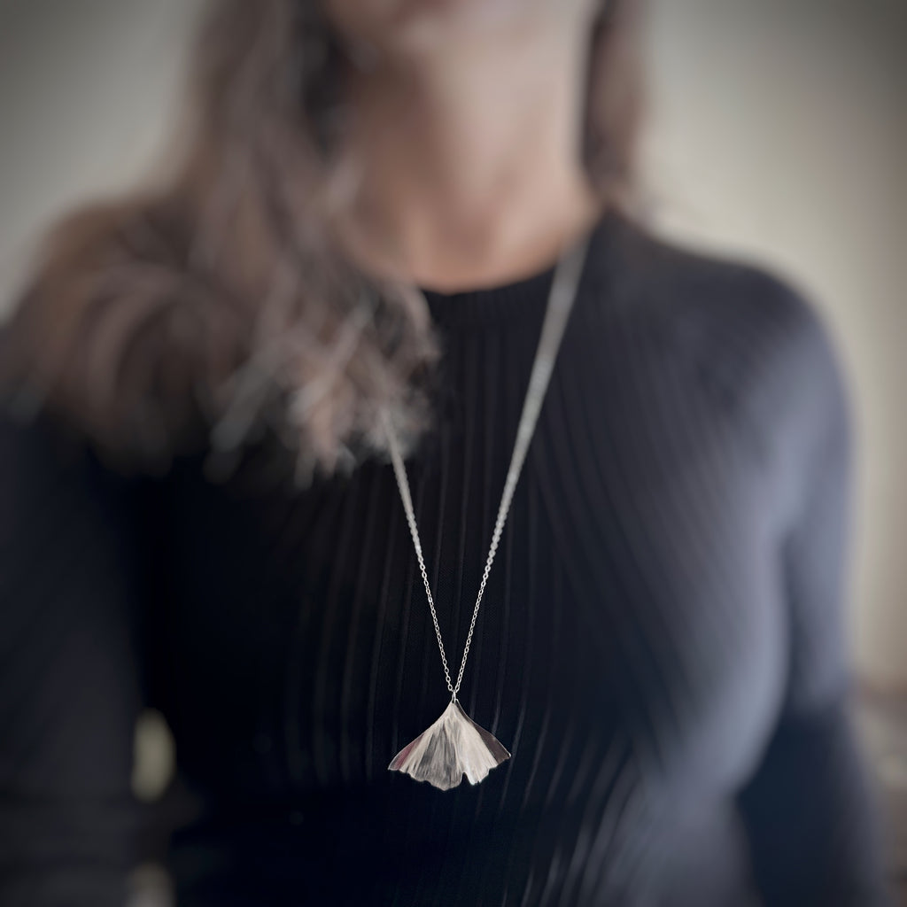 surgical grade hypoallergenic and tarnish resistant 304 stainless steel ginkgo leaf pendant on a chain necklace in the extra large size.