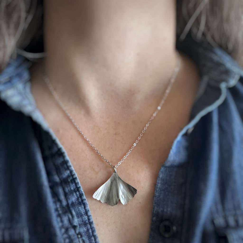surgical grade hypoallergenic and tarnish resistant 304 stainless steel ginkgo leaf pendant on a chain necklace in the large size.