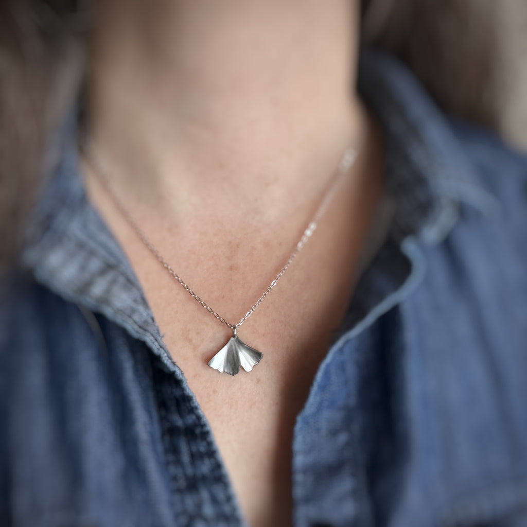surgical grade hypoallergenic and tarnish resistant 304 stainless steel ginkgo leaf pendant on a chain necklace in the small size.