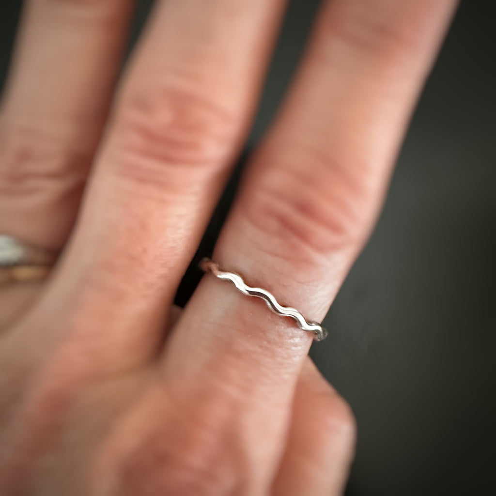 sterling silver wave ring shown on model