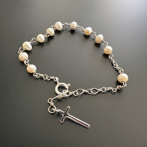 Handmade sterling silver and white freshwater pearl decade rosary bracelet bracelet with handmade cross.