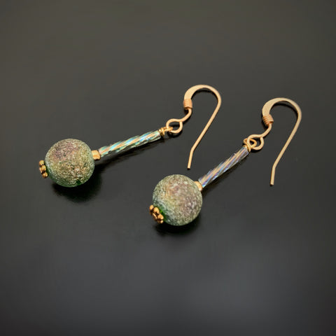 green ancient looking glass earrings with twisted columns and goldfilled ear wires