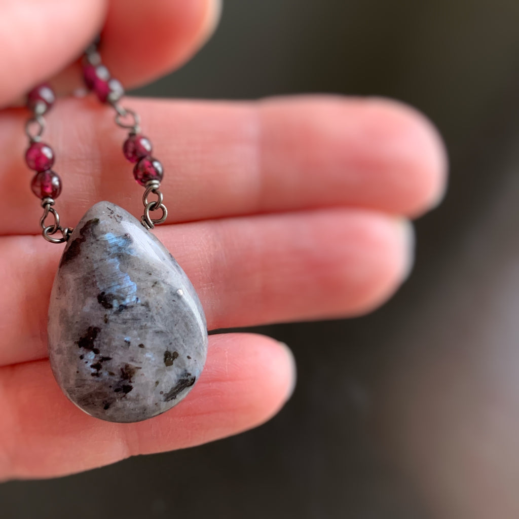 beautiful and subtle blue flash on this speckled labradorite teardrop