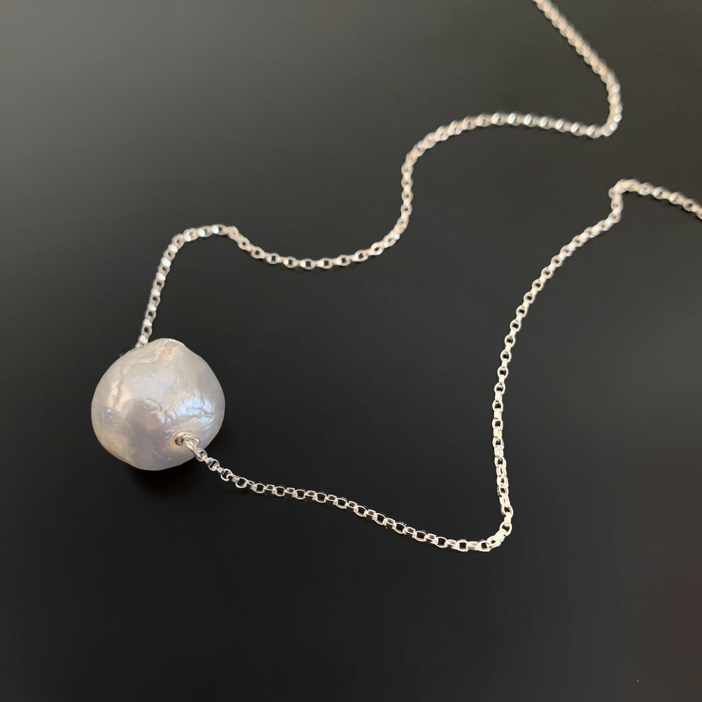 large white baroque freshwater pearl necklace on a sterling silver chain