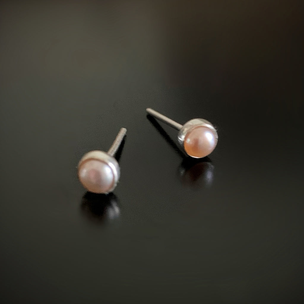 Little peach freshwater pearl and sterling silver post earrings.