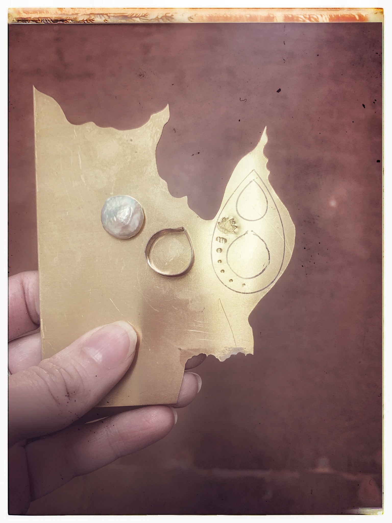 The beginnings of a new pearl and brass pendant by Erica Bapst