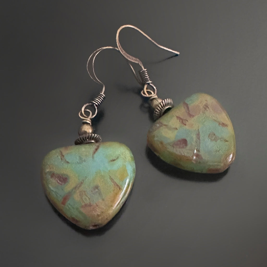 Rustic, earthy turquoise triangular drop earrings with bronze accents.