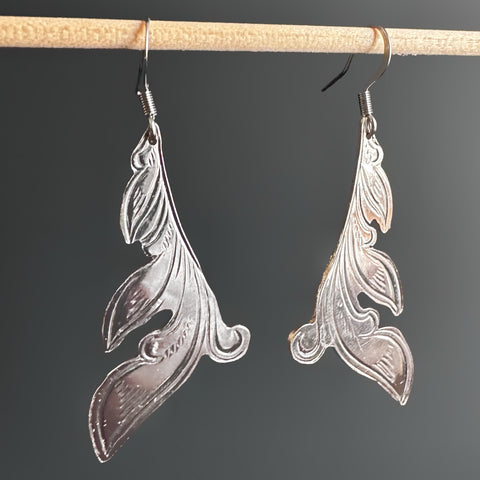 Silver earrings handcut from vintage silverplate in a leafy flourish engraved design. The french hook style ear wires are 304 grade surgical steel.
