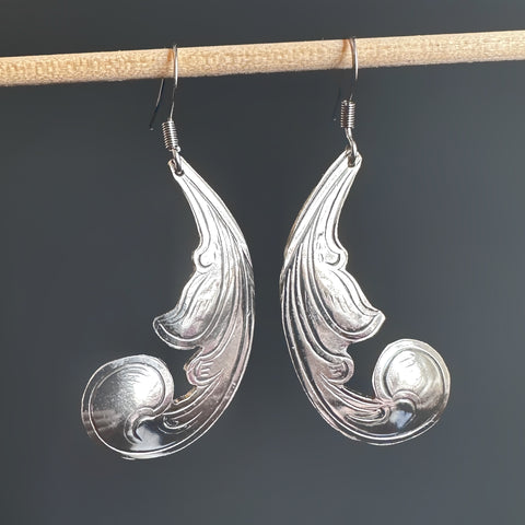 Statement earrings made of vintage silverplate in an engraved scrollwork style and hang from a french hook style 304 grade surgical steel ear wire.  