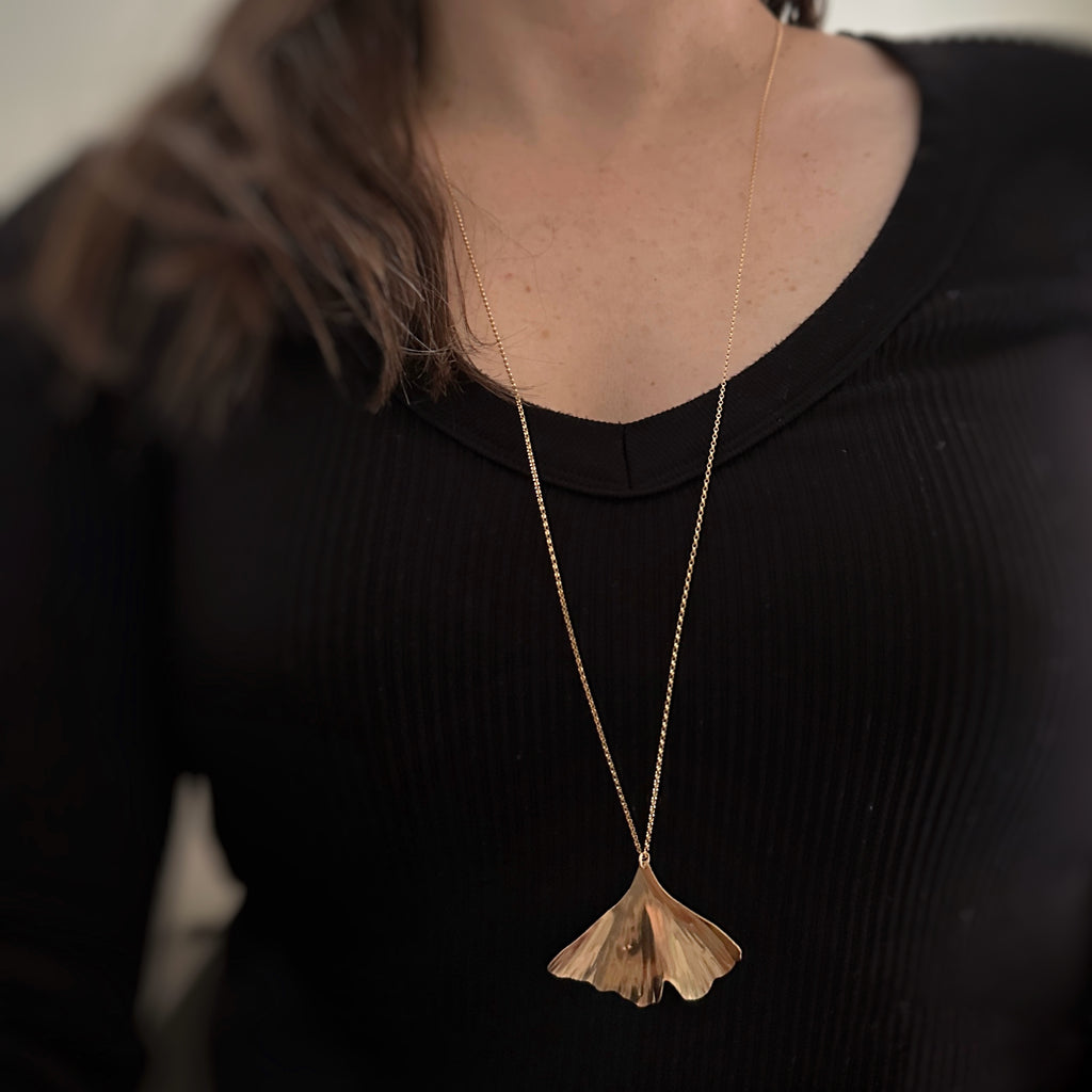 Gold ginkgo leaf pendant on sale