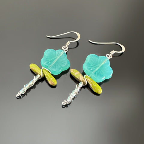 Sea green colored Czech glass flower beaded earrings with stem and two leaves.