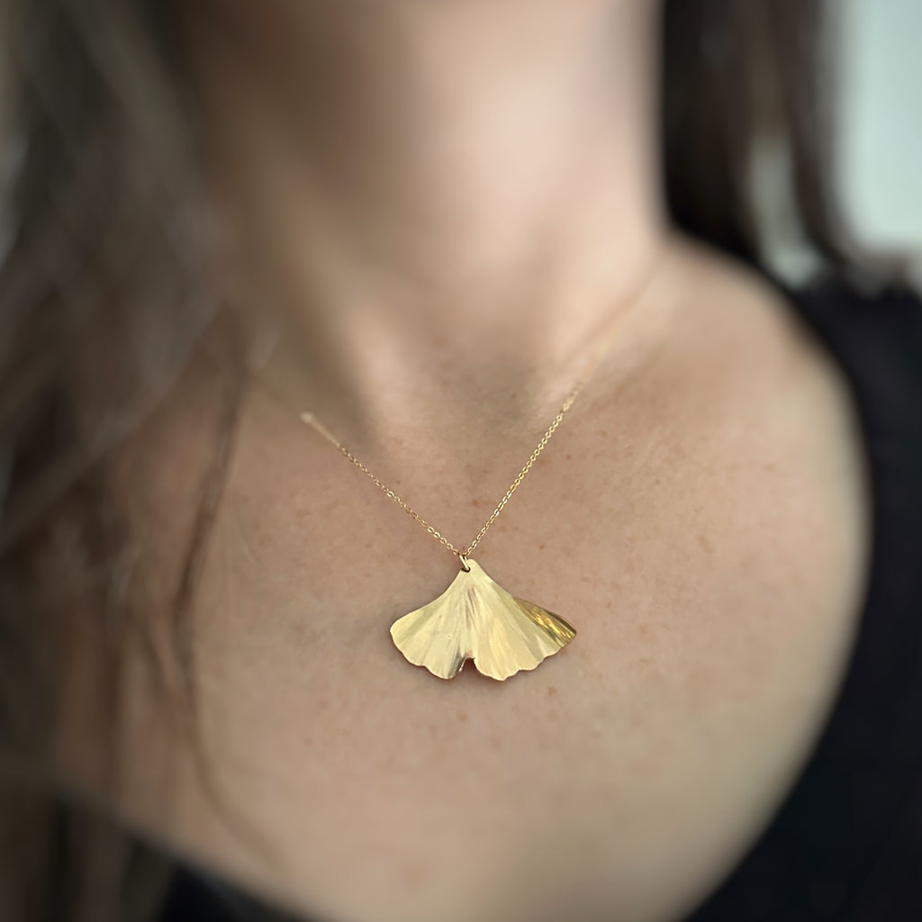 Gold ginkgo leaf pendant store