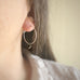 handmade sterling silver hoop earrings with a small black Austrian crystal teardrop dangle.