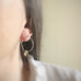 handmade sterling silver hoop earrings with a small champagne Austrian crystal teardrop dangle.