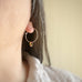 handmade sterling silver hoop earrings with a small copper Austrian crystal teardrop dangle.