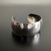 wide 1" sterling silver cuff bracelet with domed shape and hammered texture