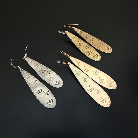 Teardrop earrings with stamped ginkgo leaves in three metals, choose from sterling silver, 14k gold filled, or oxidized brass.