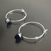 handmade sterling silver hoop earrings with a small black Austrian crystal teardrop