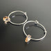 handmade sterling silver hoop earrings with a small champagne Austrian crystal teardrop