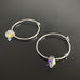 handmade sterling silver hoop earrings with a small clear ab iridescent Austrian crystal teardrop