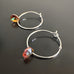 handmade sterling silver hoop earrings with a small copper Austrian crystal teardrop