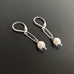 6mm white crystal pearl dangle earrings with paperclip style link and lever back ear wires