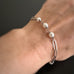 6mm white crystal pearls linked into a silvery paperclip style chain.