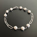 paper clip chain bracelet h 6mm white crystal pearls linked within.