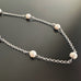 timeless pearl and chain design, 8mm white crystal pearls set within a 3.5mm surgical steel, rolo style chain. 