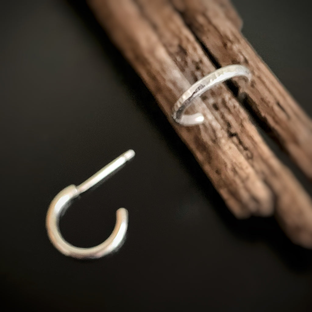 sterling silver half hoop earrings with hammered texture