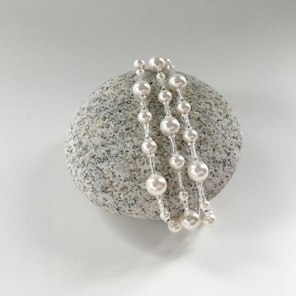 three strand modern classic bridal bracelet in pearl and glittering glass.