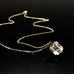 gold necklace with clear emerald cut rhinestone crystal