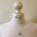 Emerald cut Clear AB silver necklace and earring set