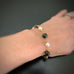 gold tone hand made link bracelet with white freshwater pearls and ocean jasper