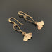 golden ginkgo leaves with tendril earrings