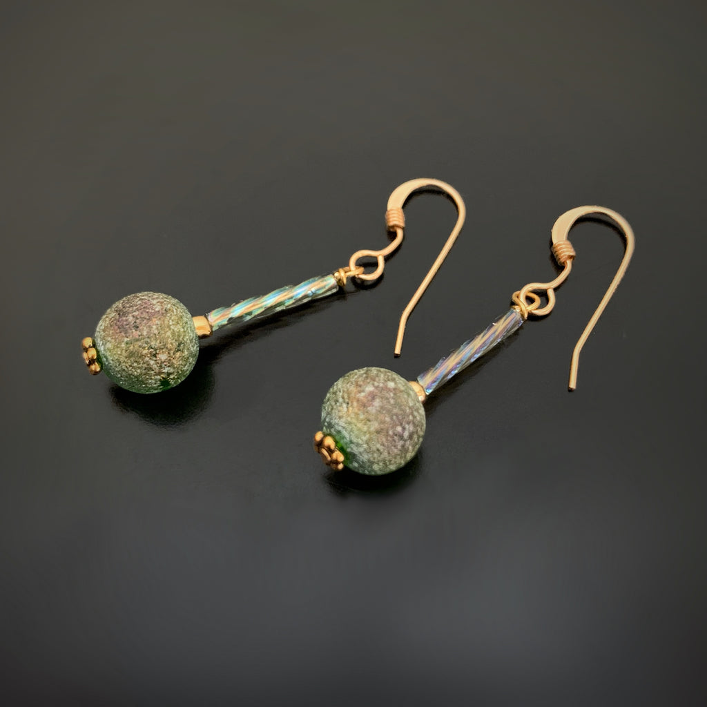 green ancient looking glass earrings with twisted columns and goldfilled ear wires