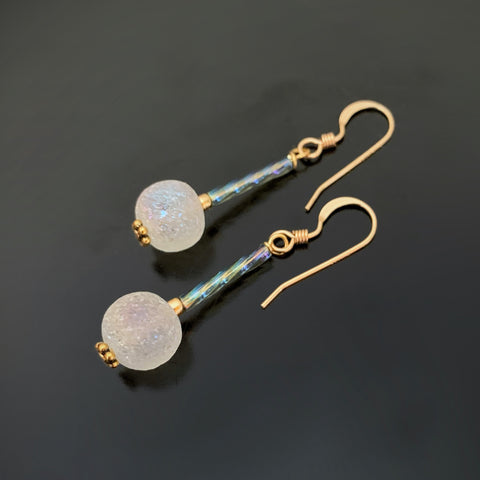 ancient looking white glass and twisted column beads on gold drop earrings