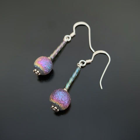 ancient looking purple iridescent glass drop earrings on sterling silver ear wires