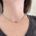 adjustable length choker necklace with gold accents, ancient looking green glass focal and twisted column glass beads