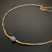 ancient looking purple glass focal on twisted column necklace