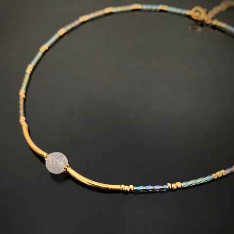 adjustable length choker necklace with gold accents, ancient looking white glass focal and twisted column glass beads