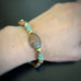 brown jasper, turquoise and gold tone bracelet